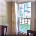 D04. Pair of window drapes. 